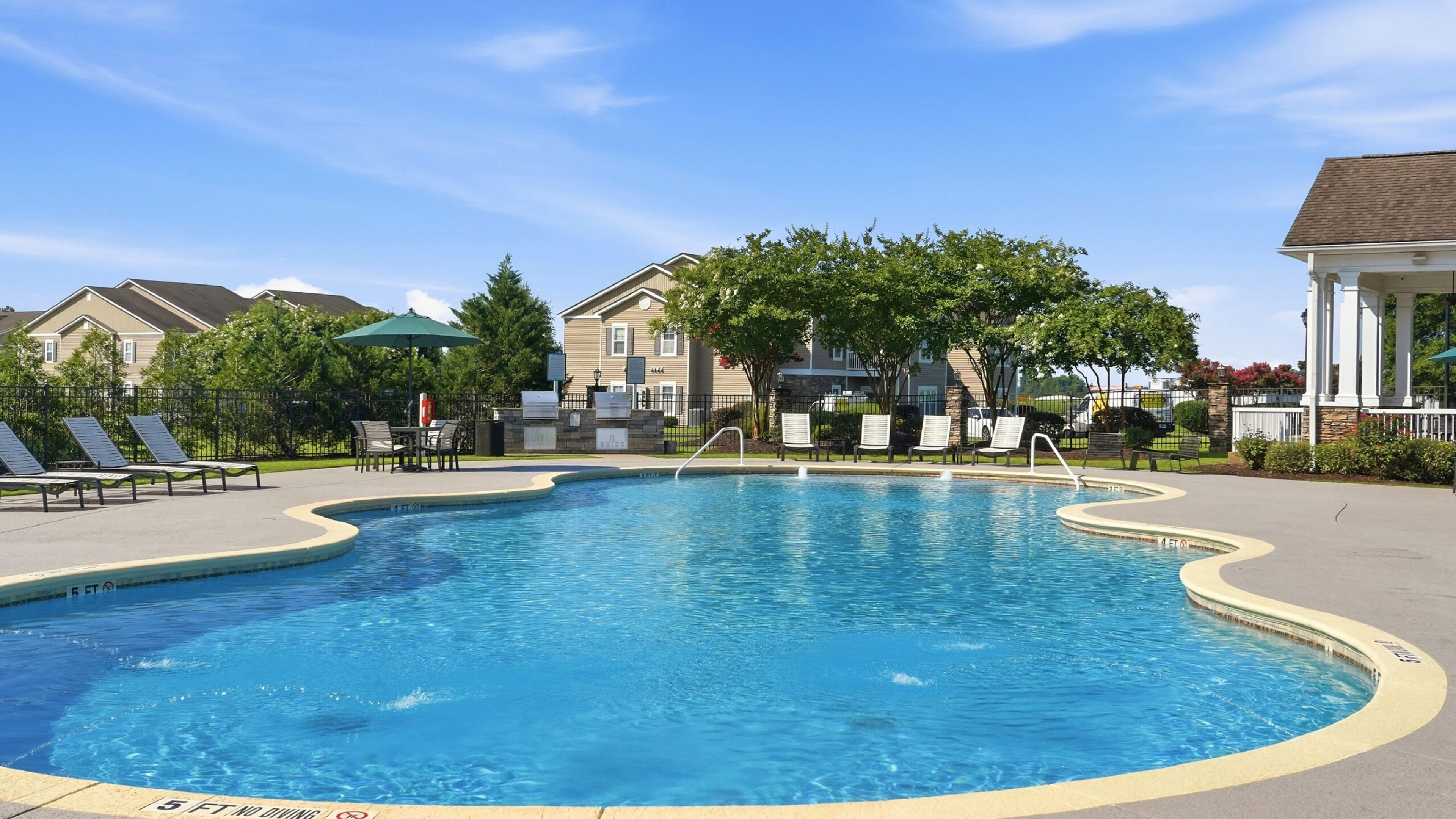 Hawthorne Crestview outdoor pavilion with tables and chairs, ceiling fans, and nice grills